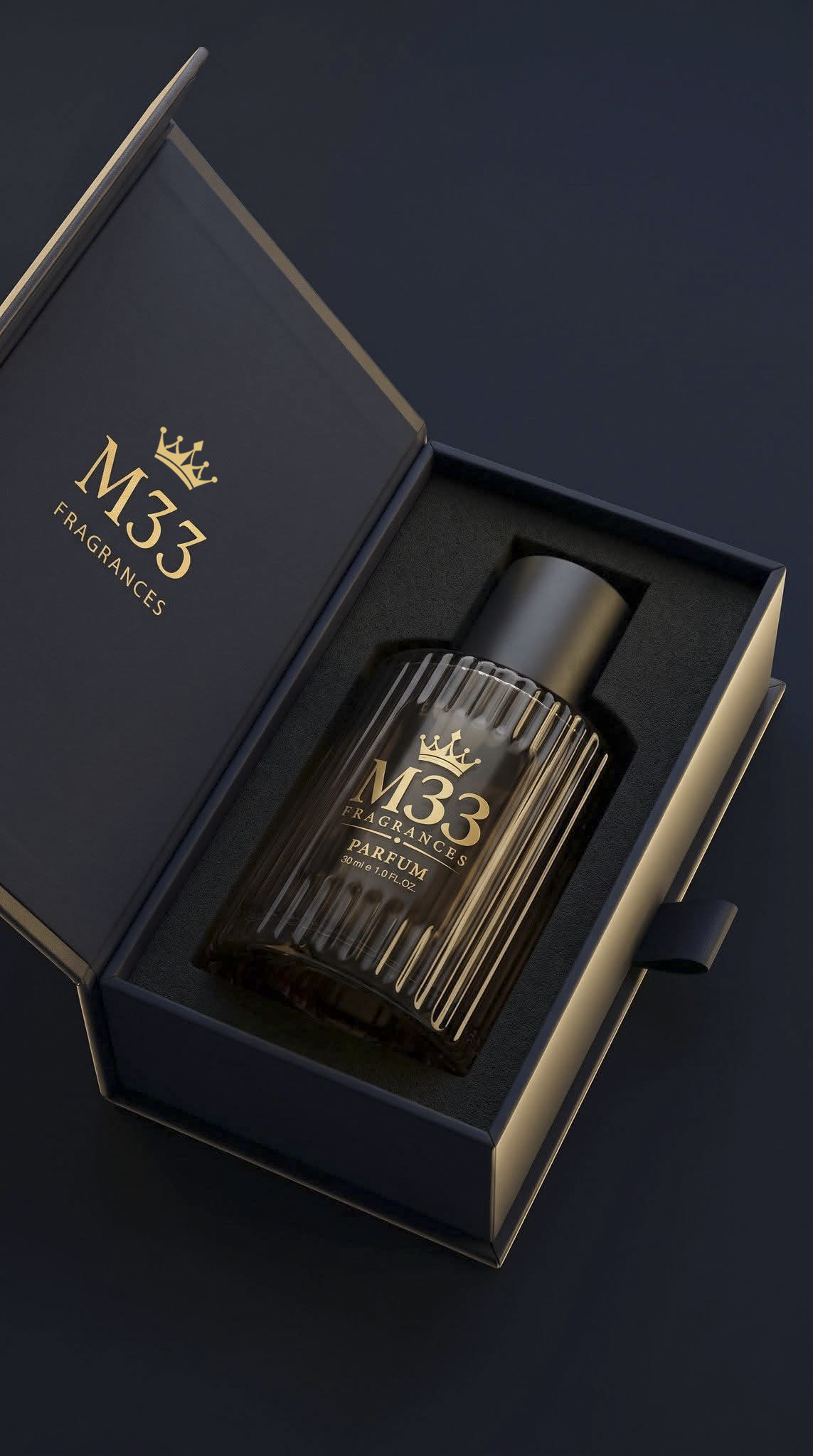 M33 fragrance in a fitted dark presentation box with gold lettering.